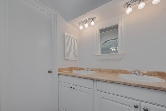 10306 Jillana Kaye Dr, Houston, TX 77086 - full bathroom with double vanity and ceiling fan