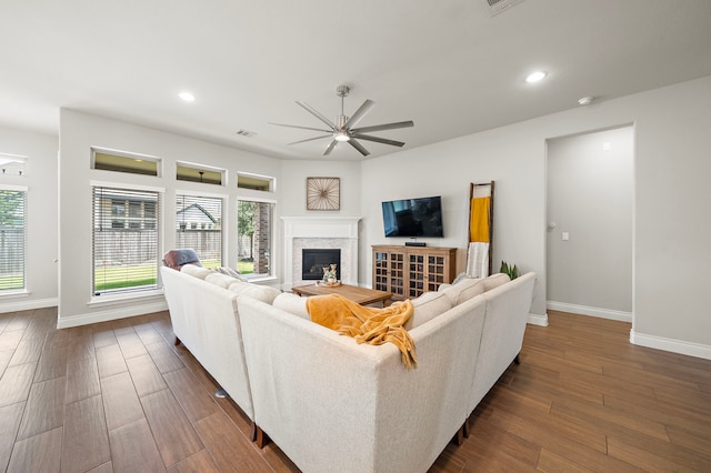 19006 River Otter Ln, Cypress, TX 77433 - living room featuring baseboards, a ceiling fan, dark wood-style flooring, plenty of natural light, and recessed lighting