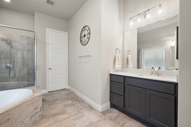 19006 River Otter Ln, Cypress, TX 77433 - full bathroom with a stall shower, vanity, a garden tub, and baseboards