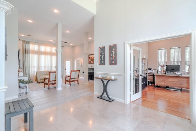 3907 Movado Ct, Spring, TX 77386 - entryway featuring french doors, recessed lighting, light tile patterned flooring, ornate columns, and a high ceiling
