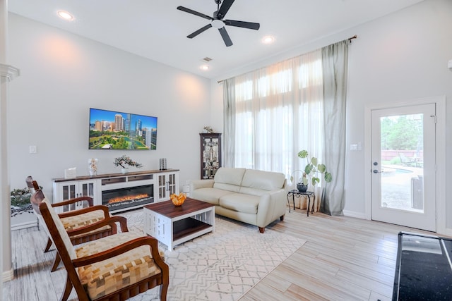 3907 Movado Ct, Spring, TX 77386 - living area featuring ceiling fan, light wood-type flooring, recessed lighting, and baseboards