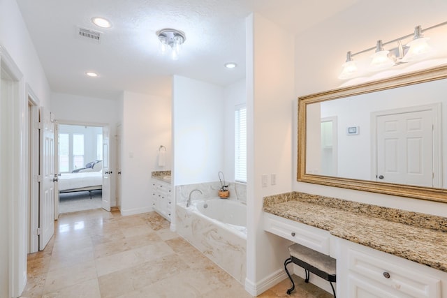 3907 Movado Ct, Spring, TX 77386 - full bathroom with connected bathroom, a bath, baseboards, recessed lighting, and vanity