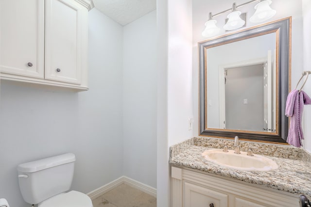 3907 Movado Ct, Spring, TX 77386 - half bath with toilet, vanity, and baseboards