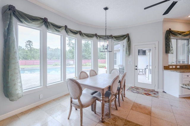 3907 Movado Ct, Spring, TX 77386 - dining room with crown molding, a ceiling fan, and baseboards
