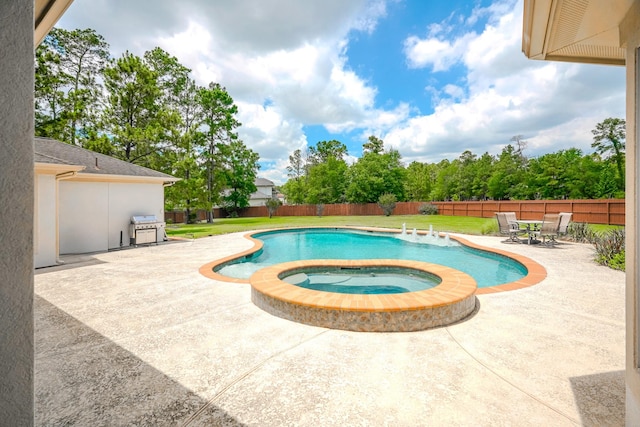 3907 Movado Ct, Spring, TX 77386 - view of swimming pool featuring a patio, grilling area, and a pool with connected hot tub