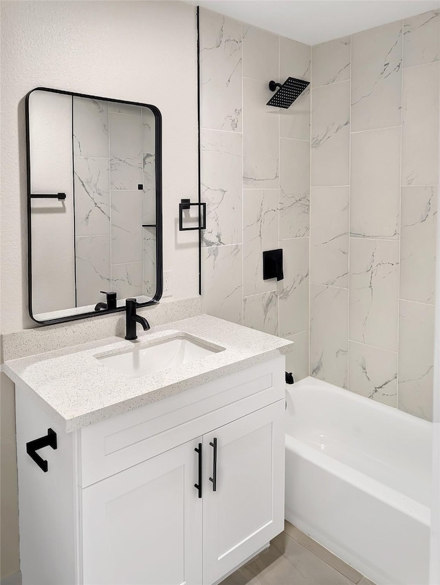 10938 Fleming Dr, Houston, TX 77013 - bathroom with vanity, shower / washtub combination, and tile walls