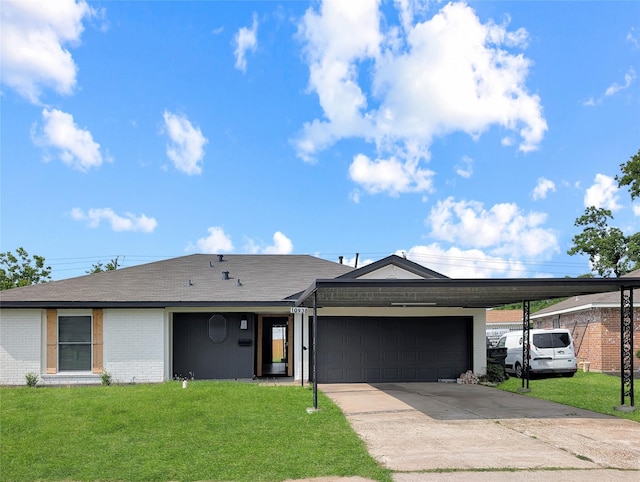 10938 Fleming Dr, Houston, TX 77013 - ranch-style home with brick siding, a garage, a front lawn, and concrete driveway