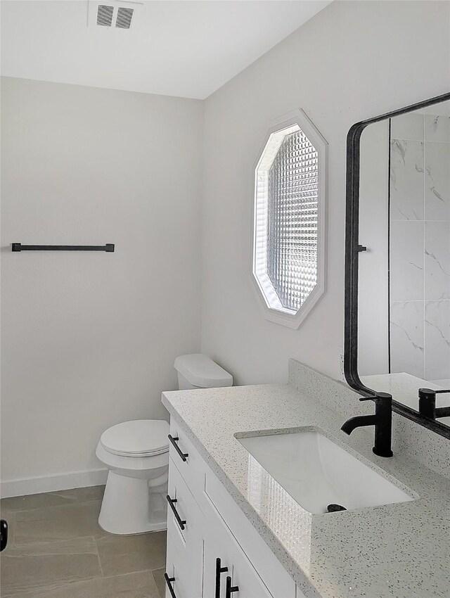 10938 Fleming Dr, Houston, TX 77013 - bathroom featuring vanity and toilet