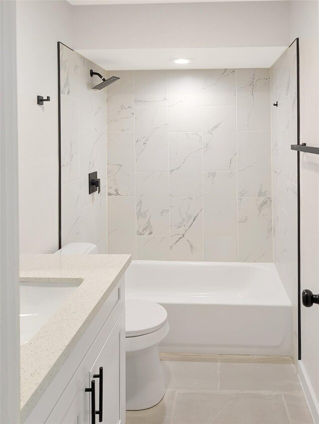 10938 Fleming Dr, Houston, TX 77013 - bathroom featuring vanity, shower / washtub combination, toilet, and marble look tiles