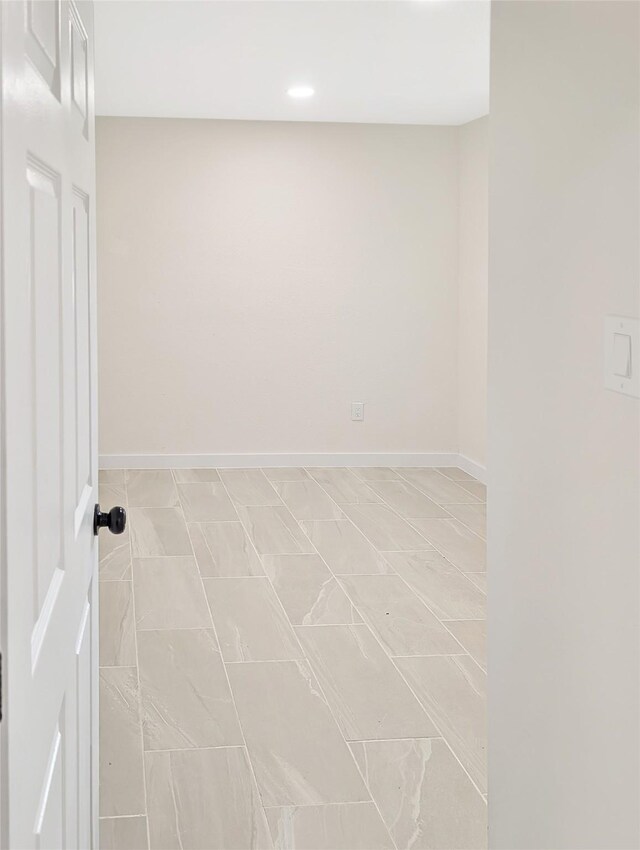 10938 Fleming Dr, Houston, TX 77013 - unfurnished room with baseboards and recessed lighting