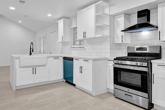 10938 Fleming Dr, Houston, TX 77013 - kitchen with gas stove, wall chimney exhaust hood, a sink, dishwasher, and open shelves