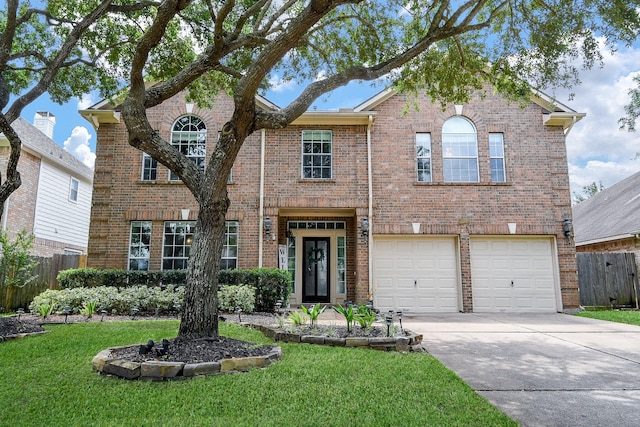 20815 Winlock Trace Dr, Katy, TX 77450 - traditional home with brick siding, driveway, and a garage