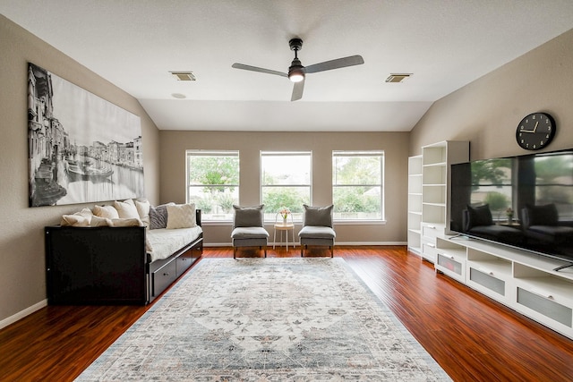 20815 Winlock Trace Dr, Katy, TX 77450 - living area featuring vaulted ceiling, healthy amount of natural light, a ceiling fan, and dark wood finished floors