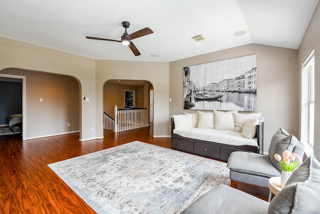 20815 Winlock Trace Dr, Katy, TX 77450 - living room with arched walkways, ceiling fan, wood finished floors, and baseboards