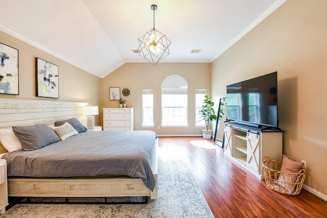 20815 Winlock Trace Dr, Katy, TX 77450 - bedroom with wood finished floors, ornamental molding, baseboards, and lofted ceiling