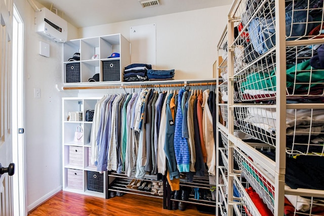 20815 Winlock Trace Dr, Katy, TX 77450 - walk in closet featuring wood finished floors
