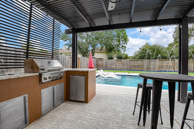 20815 Winlock Trace Dr, Katy, TX 77450 - fenced backyard with a sink and a patio