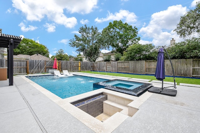 20815 Winlock Trace Dr, Katy, TX 77450 - view of swimming pool featuring a patio area, a pool with connected hot tub, and a fenced backyard