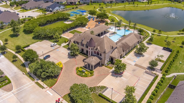 19015 Giara Pony Trl, Tomball, TX 77377 - aerial view of residential area with a pool and a large body of water