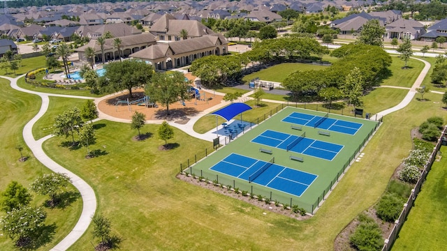 19015 Giara Pony Trl, Tomball, TX 77377 - aerial perspective of suburban area with a pool