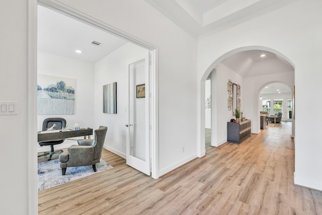 19015 Giara Pony Trl, Tomball, TX 77377 - office area with light wood-style floors, arched walkways, and recessed lighting