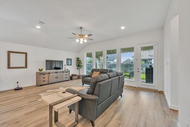 19015 Giara Pony Trl, Tomball, TX 77377 - living room with healthy amount of natural light, ceiling fan, light wood-type flooring, and lofted ceiling