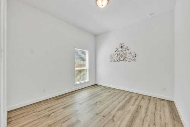 19015 Giara Pony Trl, Tomball, TX 77377 - empty room with wood finished floors and baseboards