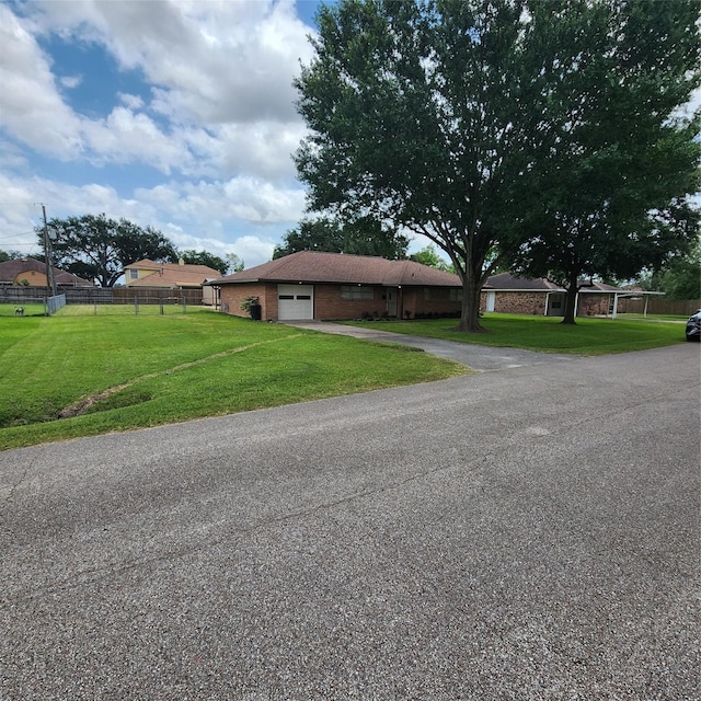 3625 Whatley Dr, Deer Park, TX 77536 - ranch-style home featuring a garage and driveway