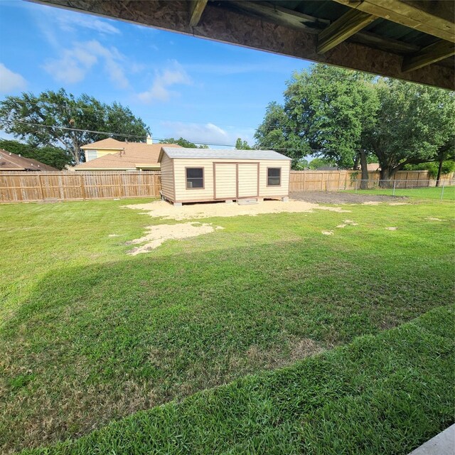 3625 Whatley Dr, Deer Park, TX 77536 - fenced backyard with a storage shed