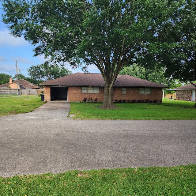 3625 Whatley Dr, Deer Park, TX 77536 - single story home with an attached garage, asphalt driveway, and brick siding
