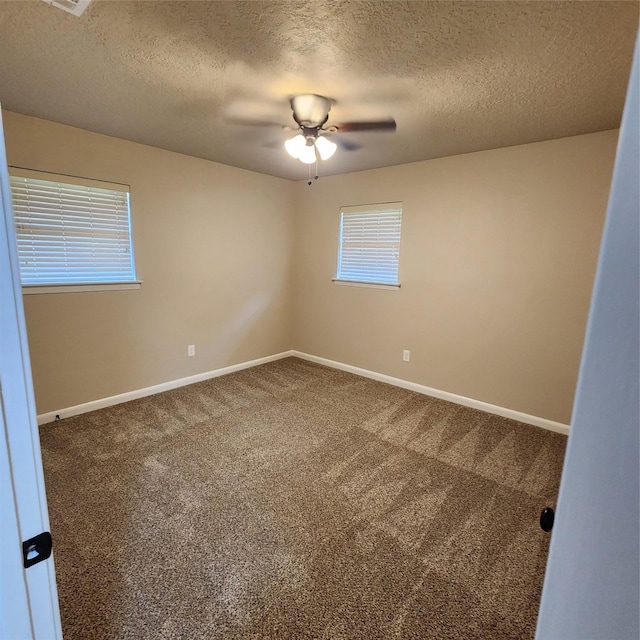 3625 Whatley Dr, Deer Park, TX 77536 - carpeted empty room featuring a textured ceiling, a ceiling fan, and baseboards