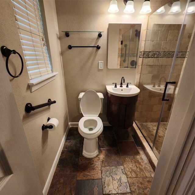 3625 Whatley Dr, Deer Park, TX 77536 - full bathroom featuring a shower stall and stone tile floors