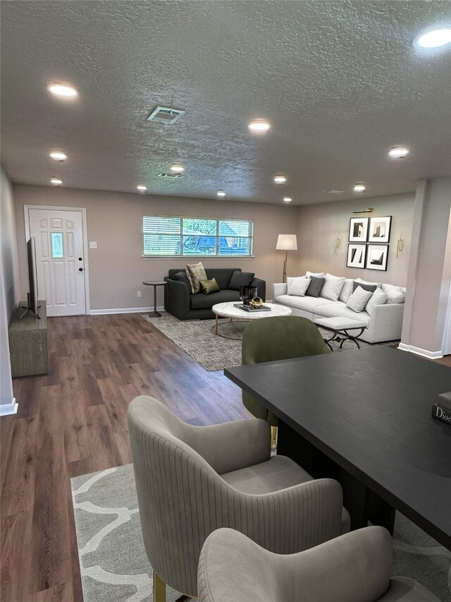 3625 Whatley Dr, Deer Park, TX 77536 - living area with a textured ceiling, wood finished floors, and recessed lighting