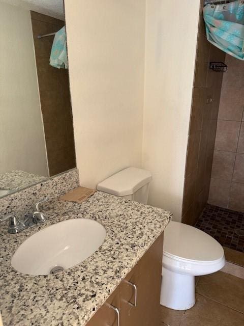 7358 Crownwest St Unit 7358, Houston, TX 77072 - full bath featuring a stall shower, vanity, toilet, and tile patterned flooring