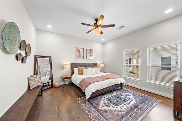 1226 W 17th St Unit D, Houston, TX 77008 - bedroom featuring dark wood finished floors, recessed lighting, a ceiling fan, and baseboards