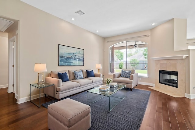 20506 Nellie Gail Trail Ln, Katy, TX 77450 - living area with wood finished floors, baseboards, a tiled fireplace, recessed lighting, and ceiling fan