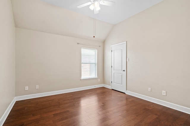 20506 Nellie Gail Trail Ln, Katy, TX 77450 - spare room featuring a ceiling fan, vaulted ceiling, dark wood-type flooring, and baseboards