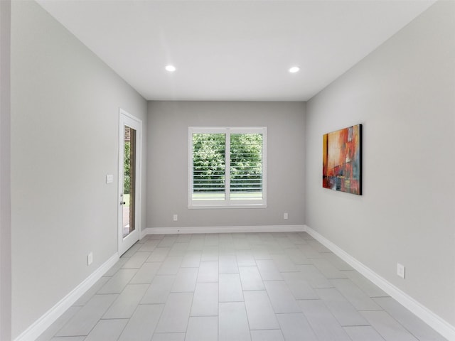 15806 Gibson Grass Ct, Spring, TX 77379 - empty room featuring healthy amount of natural light, recessed lighting, and baseboards
