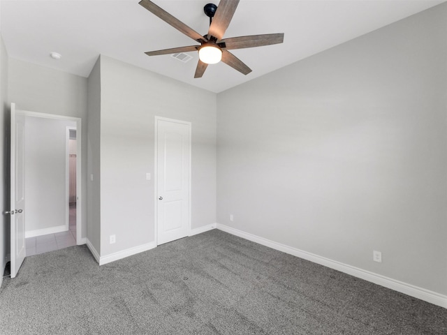 15806 Gibson Grass Ct, Spring, TX 77379 - unfurnished bedroom featuring carpet floors, baseboards, and ceiling fan