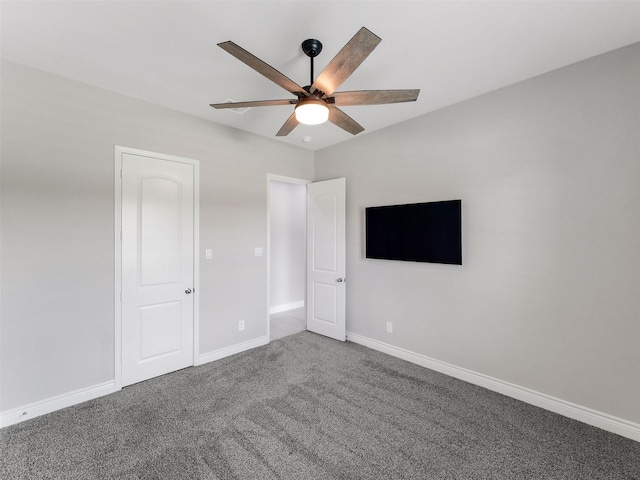 15806 Gibson Grass Ct, Spring, TX 77379 - unfurnished bedroom featuring carpet floors, ceiling fan, and baseboards