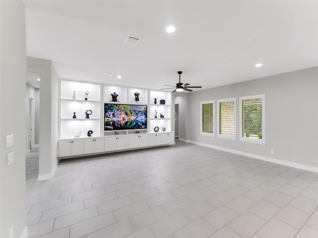 15806 Gibson Grass Ct, Spring, TX 77379 - unfurnished living room with a ceiling fan, baseboards, recessed lighting, and built in shelves