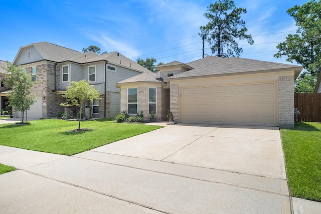 11311 Cascading Stream Way, Houston, TX 77044 - view of front of property with brick siding, a garage, and concrete driveway