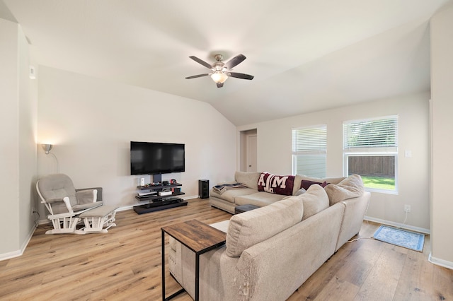 11311 Cascading Stream Way, Houston, TX 77044 - living area featuring a ceiling fan, light wood-type flooring, vaulted ceiling, and baseboards