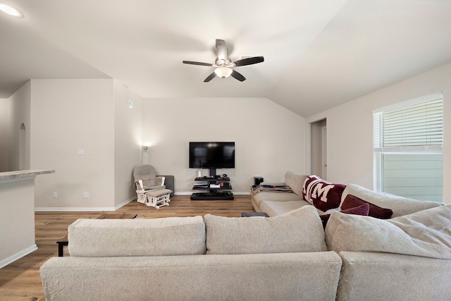11311 Cascading Stream Way, Houston, TX 77044 - living area with ceiling fan, wood finished floors, baseboards, and lofted ceiling