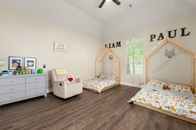 19509 Desna Dr, Porter, TX 77365 - bedroom with wood finished floors, baseboards, vaulted ceiling, and ceiling fan