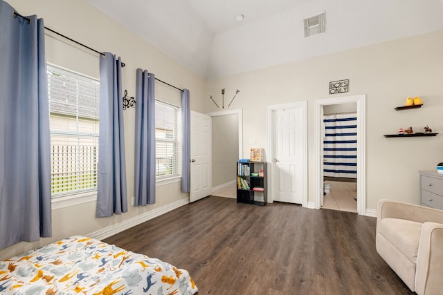 19509 Desna Dr, Porter, TX 77365 - bedroom featuring wood finished floors, multiple windows, baseboards, and a high ceiling
