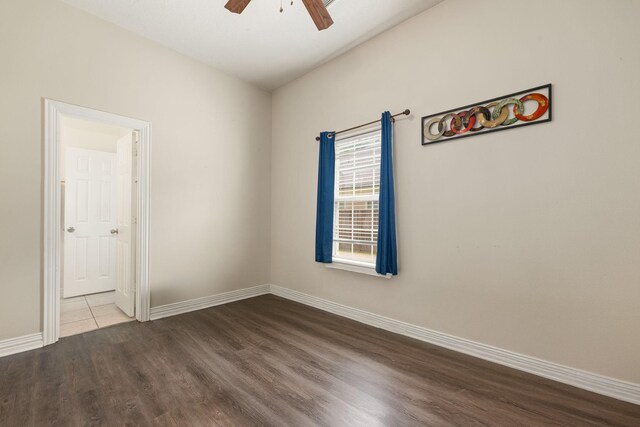 19509 Desna Dr, Porter, TX 77365 - spare room with dark wood-style floors, a ceiling fan, and baseboards