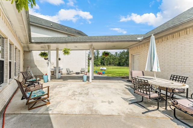 19509 Desna Dr, Porter, TX 77365 - view of patio / terrace featuring outdoor dining space