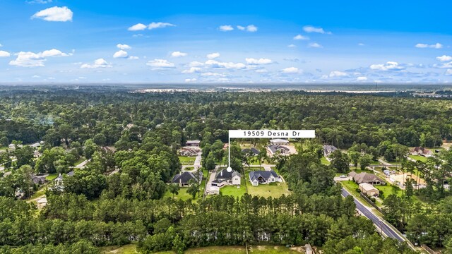 19509 Desna Dr, Porter, TX 77365 - aerial view of property's location with a forest and nearby suburban area