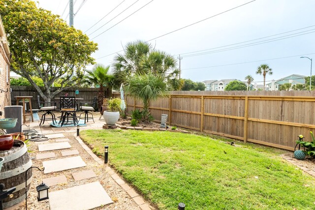 29 Quintana Dr, Galveston, TX 77554 - view of yard with a patio area
